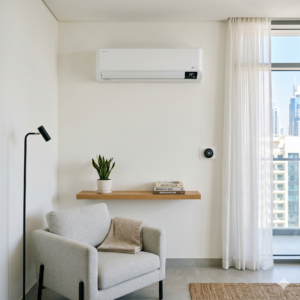 Modern energy-efficient split AC in a bright UAE apartment with sleek wall-mounted unit and digital thermostat display in a clean minimalist interior