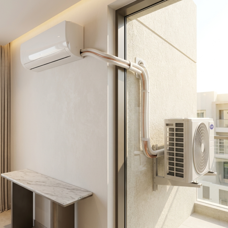 Modern split AC installation with indoor and outdoor units connected by insulated copper pipes, clean wall finish, realistic lighting in a UAE home